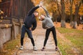 Couple are leading a healthy lifestyle doing sports exercises . Outdoors. Royalty Free Stock Photo