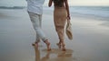 Couple legs crossing ocean at summer closeup. People rest foggy coast together Royalty Free Stock Photo