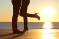 Couple legs hugging in love on the beach Royalty Free Stock Photo