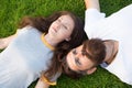 Couple lie on green grass. man and woman relax outdoor. dreaming concept. Dating concept. bearded hipster and girl