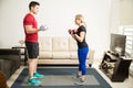 Couple lifting weights and working out Royalty Free Stock Photo