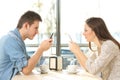 Couple on line obsessed with smart phones