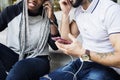 A couple listening to the streaming music on smartphone togetherness Royalty Free Stock Photo