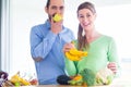 Couple living healthy eating fruits and vegetables