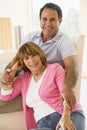 Couple in living room smiling