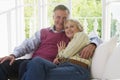 Couple in living room smiling