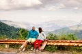 Couple with longboard and skateboard travel in tropcis of Asia Royalty Free Stock Photo