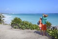 Couple look out over the Caribbean Sea in Tulum, Yucatan Peninsula, Mexico Royalty Free Stock Photo