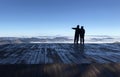 couple looking at the city from a beautiful view Royalty Free Stock Photo