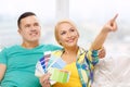 Couple looking at color samples in new home