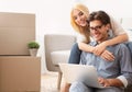 Couple Looking At Design Project For New Apartment On Laptop Royalty Free Stock Photo