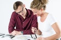 Couple looking at floor plans for new place Royalty Free Stock Photo