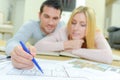 Couple looking at house plans Royalty Free Stock Photo