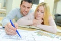 Couple looking at house plans Royalty Free Stock Photo