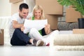 Couple looking at house plans Royalty Free Stock Photo