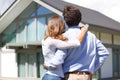 Couple looking at house