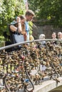 Couple looking at love locks Riga