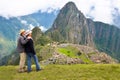 Couple looking at Machu picchu Peru