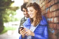 Couple looking at a mobile phone Royalty Free Stock Photo