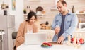 Couple looking at online recipe Royalty Free Stock Photo