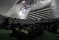 Couple looking at a projection in a Fulldome.