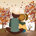 Couple looks at the landscape in the autumn