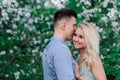 Couple in love back light silhouette at lake orange sunset Royalty Free Stock Photo