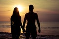 Couple in love back light silhouette on sea