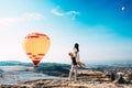 Couple in love among balloons. A guy proposes to a girl. Couple in love in Pamukkale. Couple in Turkey. Honeymoon in the mountains Royalty Free Stock Photo