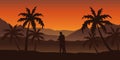 Couple in love at beautiful palm tree silhouette landscape in orange colors Royalty Free Stock Photo