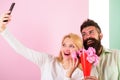 Couple in love bouquet dating celebrate anniversary relations. Taking selfie photo. Capturing moment to memorize. Woman Royalty Free Stock Photo