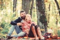 Couple in love celebrate anniversary picnic date. Couple cuddling drinking wine. Enjoying their perfect date. Happy Royalty Free Stock Photo