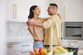 Couple, love and dancing together in kitchen happy at home bonding, spend time and relax. Young married latin man and Royalty Free Stock Photo