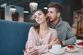 Couple in love on a date in cafe in Valentines day