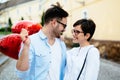 Couple in love holding red baloons hearts on valentine day Royalty Free Stock Photo