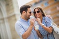 Couple in love drinking juice, outdoor