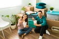 Portrait of a young woman and man eating take out food Royalty Free Stock Photo