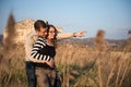 Couple in love on engagement day in natural park. Royalty Free Stock Photo