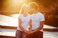 Couple in love enjoying moments during sunset Royalty Free Stock Photo