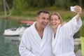 couple in love enjoying wellness weekend and taking selfies Royalty Free Stock Photo