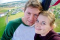 Couple in love flying in a hot air balloon Royalty Free Stock Photo