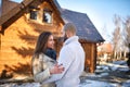 Couple in love in front of mountain house Royalty Free Stock Photo