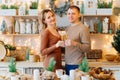 a couple in love with glasses of champagne in the christmas& x27;s kitchen. romantic. Royalty Free Stock Photo