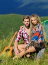 Couple in love happy relaxing nature background. Love concept. Camping vacation. Hiking romance. Camping in mountains Royalty Free Stock Photo