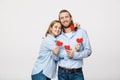 Couple in love holding red paper hearts Royalty Free Stock Photo