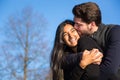 Couple in love hugging and kissing outside Royalty Free Stock Photo