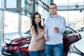 Couple in love with keys from new car Royalty Free Stock Photo