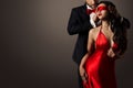 Couple Love Kiss, Man and Blindfolded Woman in Red Dress Royalty Free Stock Photo