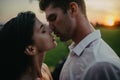 Couple in love kisses and embraces under drops of rain Royalty Free Stock Photo