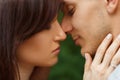 Couple kissing happiness fun. Interracial young couple Royalty Free Stock Photo